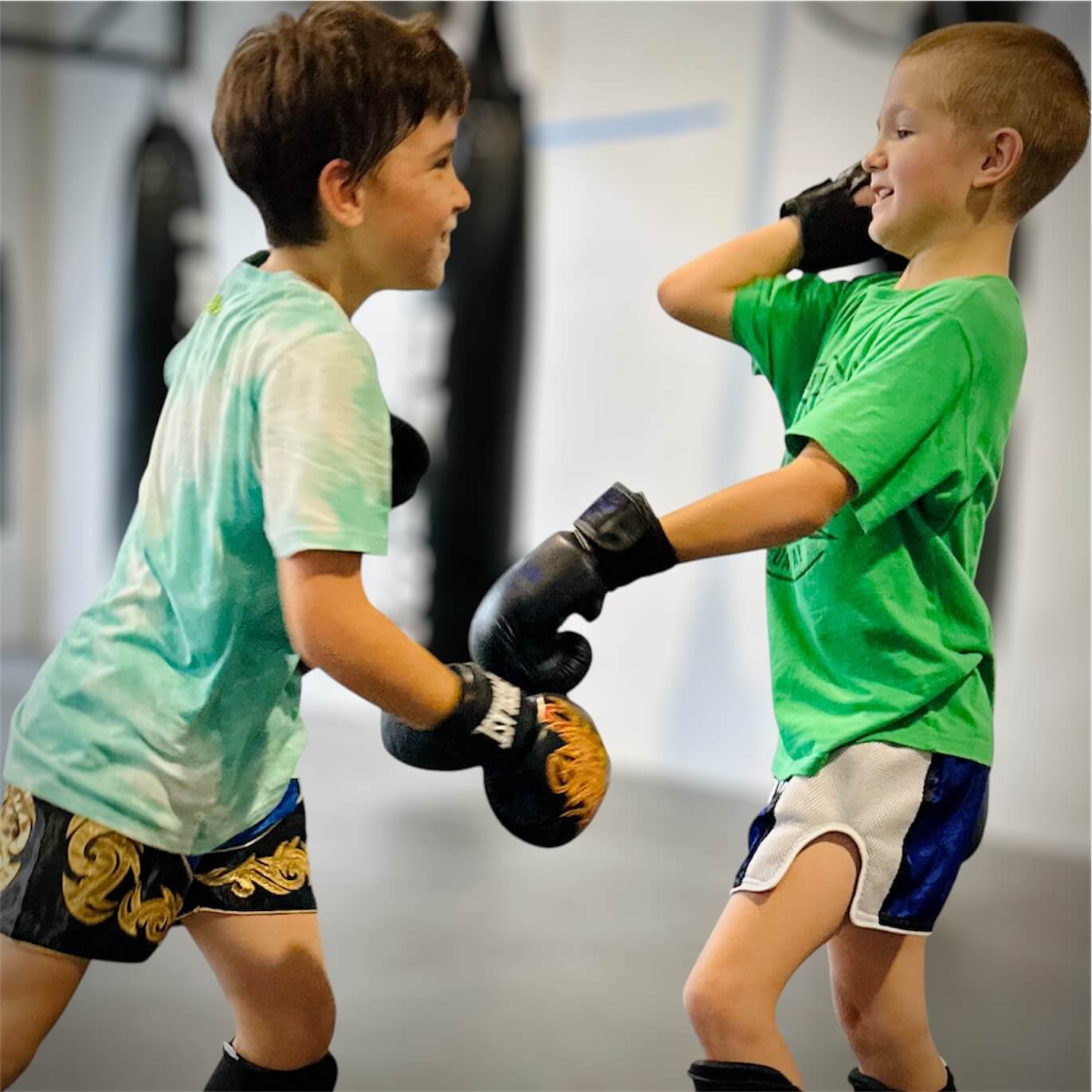 Children enjoying a Muay Thai training session